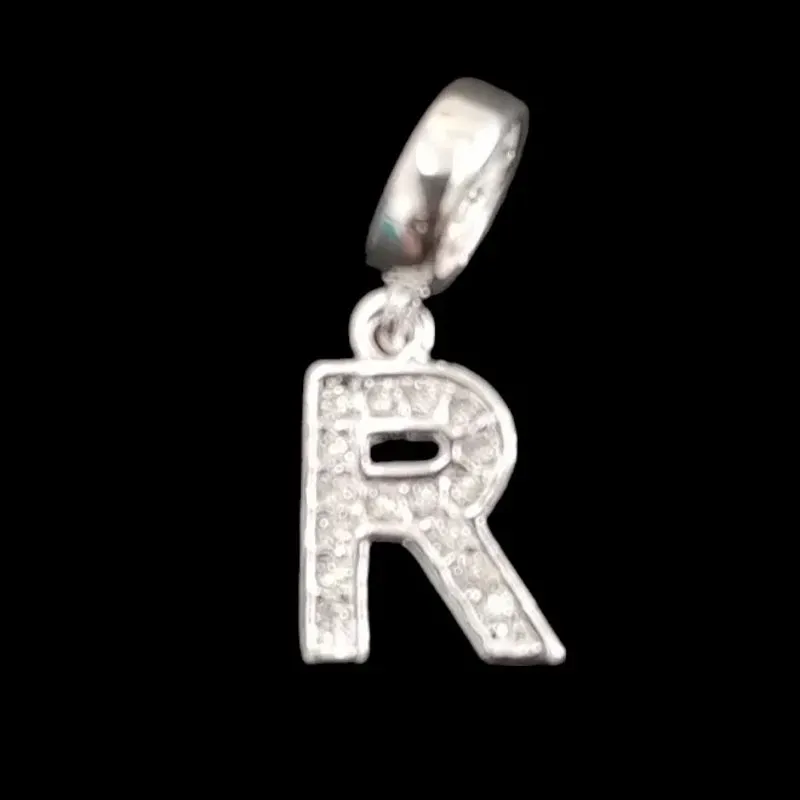 BERLOQUE LETRA R COM MICROZIRCONIA