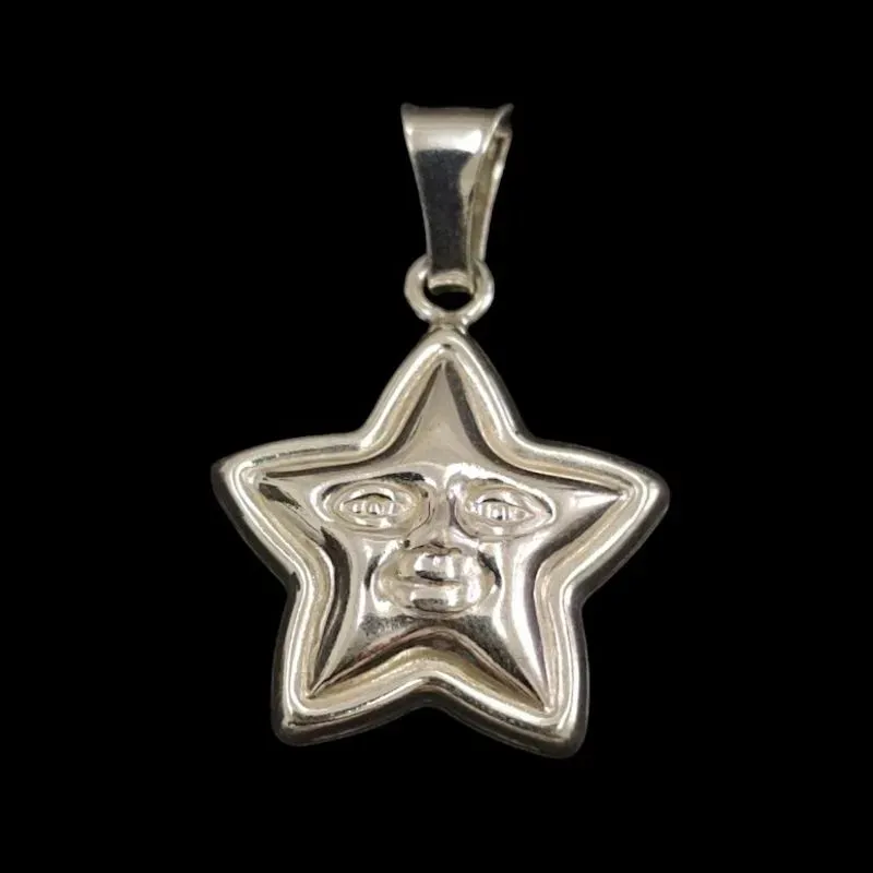 PINGENTE ESTRELA ABAULADA DESENHADA