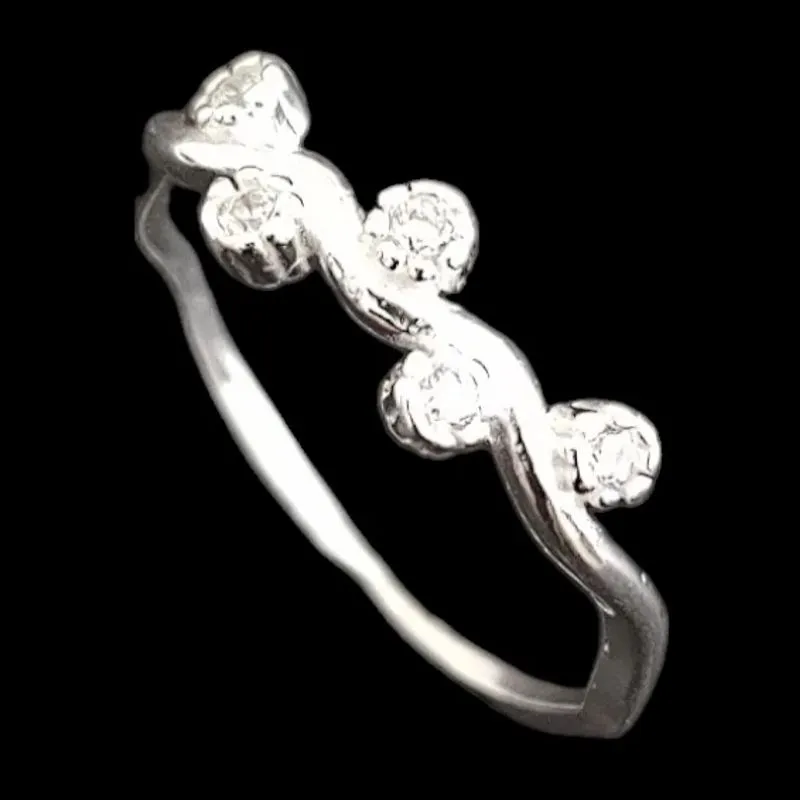 ANEL ALIANÇA SINUOSA 5 PEDRAS ZIRCONIA